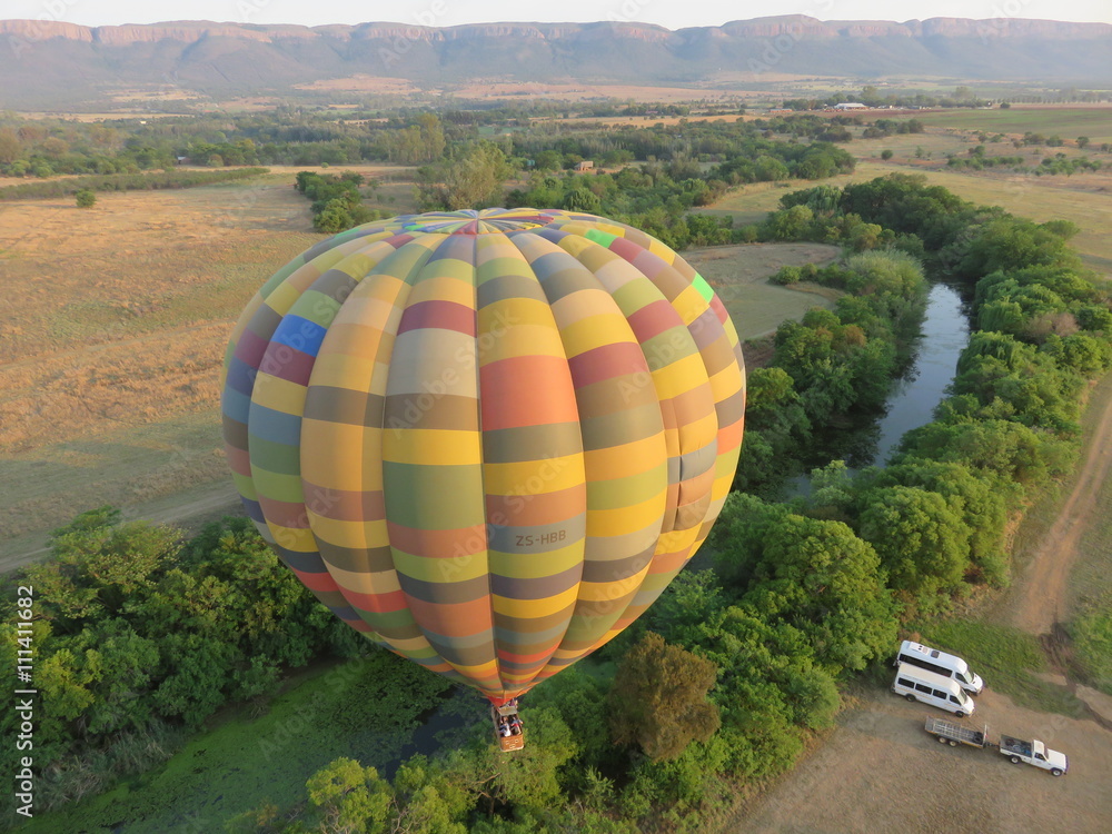 Fototapeta premium Hot air balloon ride in the early morning