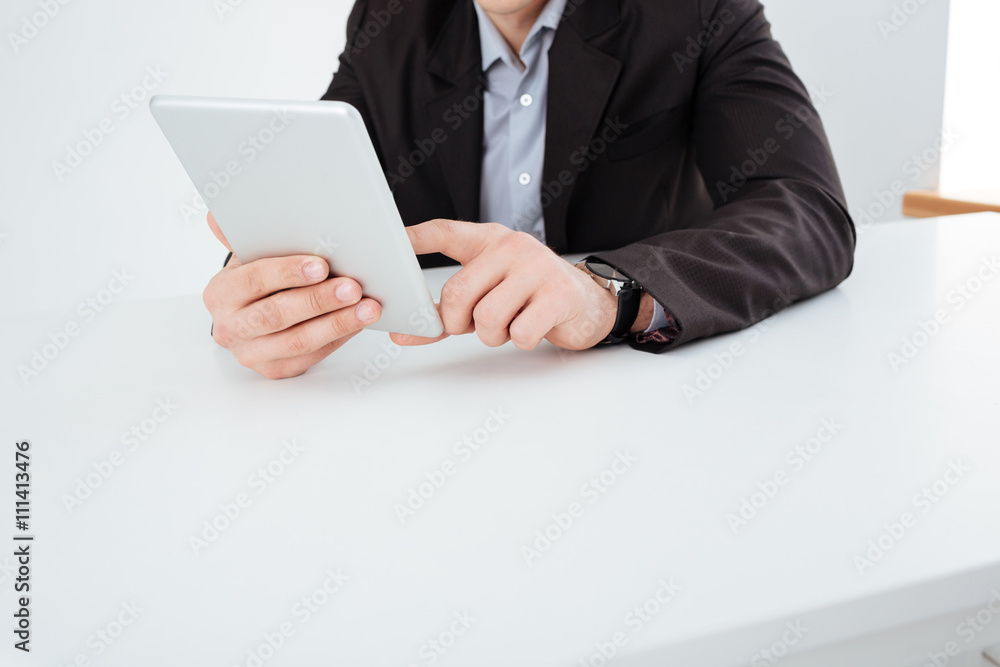 Businessman using tablet computer Businessman using tablet computer