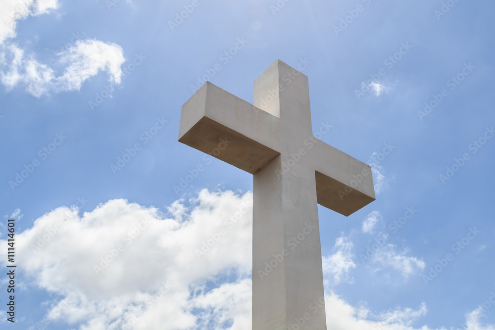 Sun rays from above shining on the historic Mt. Helix cross with a cloudy blue sky in La Mesa, a city in San Diego, California. Sun rays from above shining on the historic Mt. Helix cross with a cloudy blue sky in La Mesa, a city in San Diego, California.