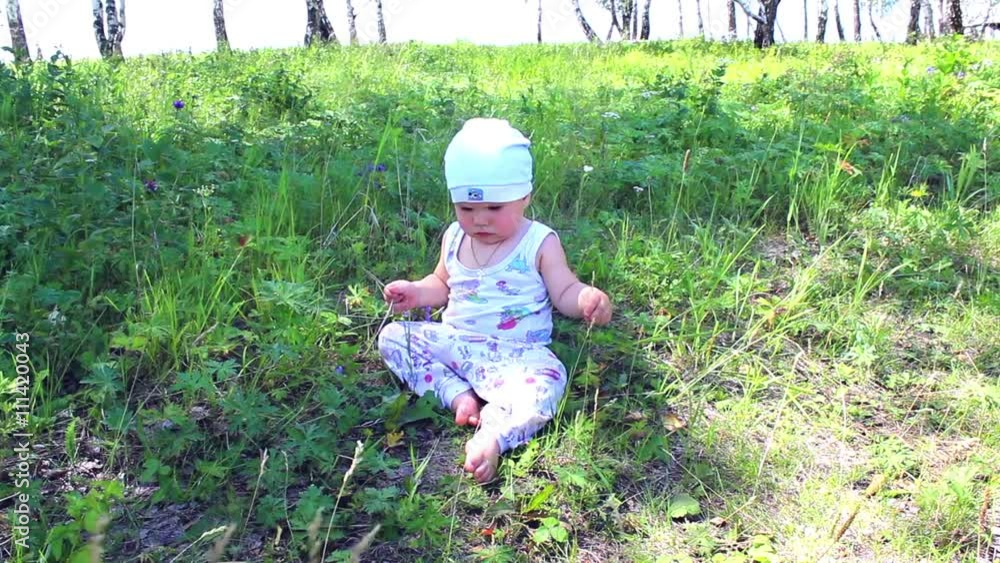 the baby crawls in a cereal field the baby crawls in a cereal field