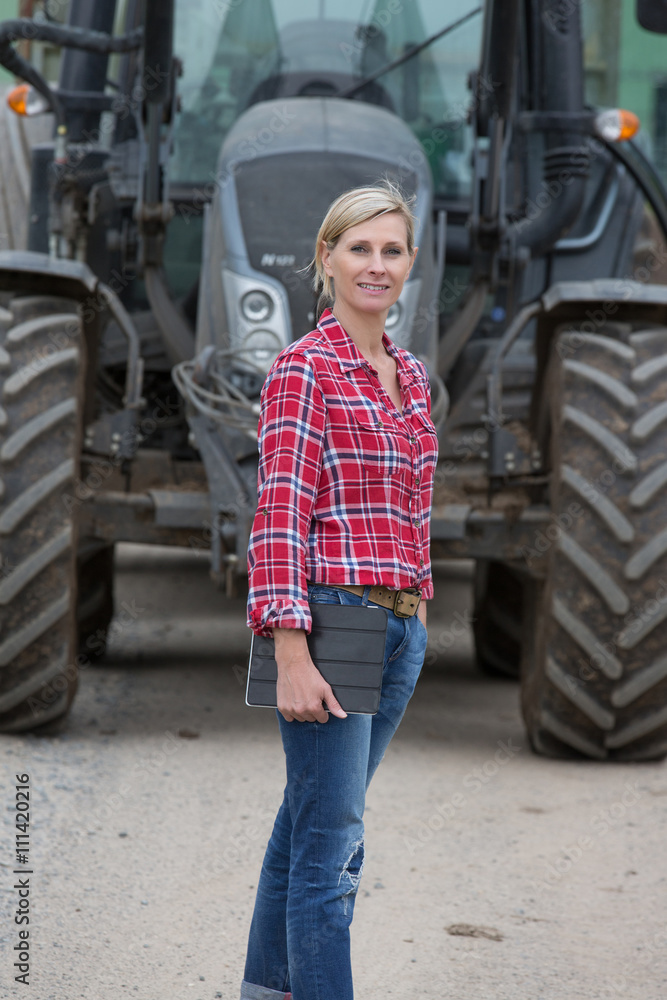 female farmer with tractor female farmer with tractor