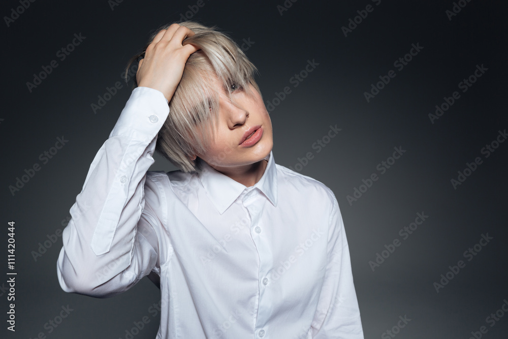 Stylish blonde woman looking at camera Stylish blonde woman looking at camera