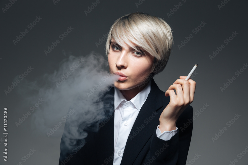 Fototapeta premium Stylish woman smoking