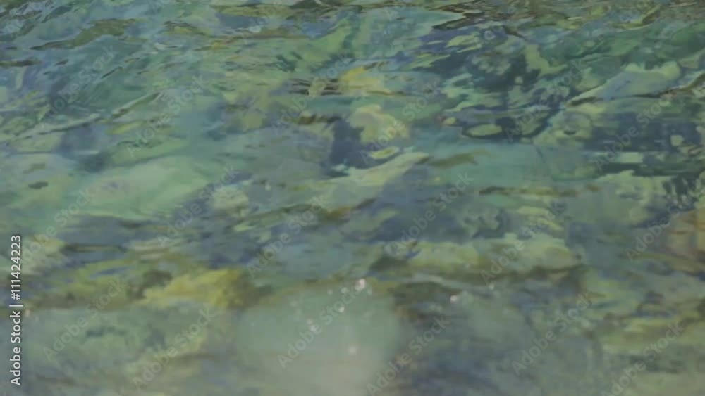 In the water you can see rocks everywhere and terrible cold. In the water you can see rocks everywhere and terrible cold.