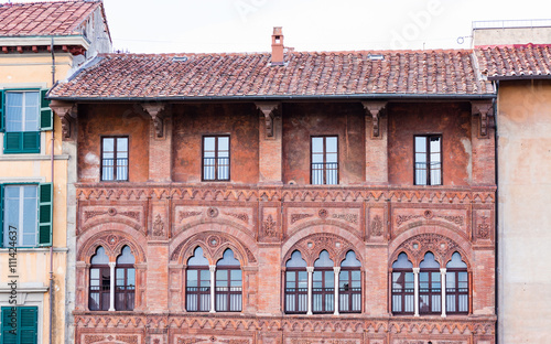 Detail of an old building in the center of Pisa