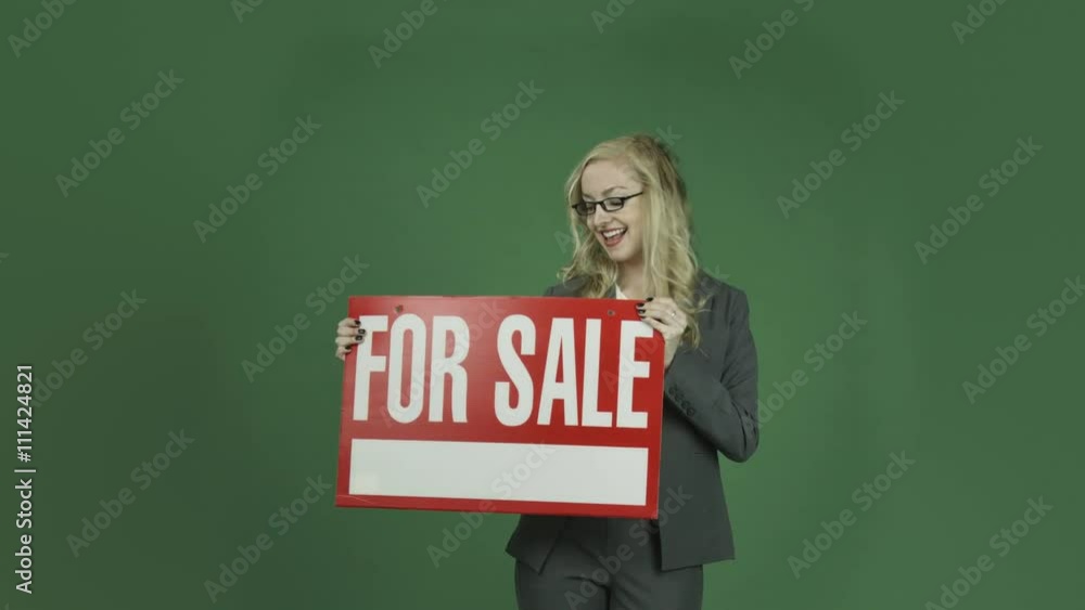 caucasian businesswoman isolated on chroma green screen background for sale sign caucasian businesswoman isolated on chroma green screen background for sale sign
