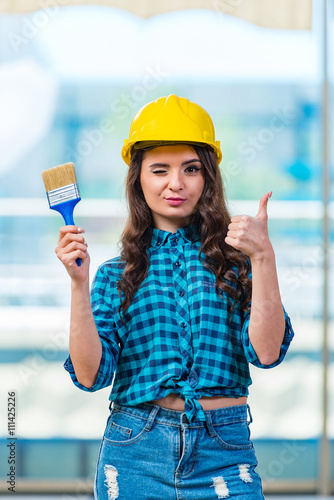 Nice young woman painer working photo