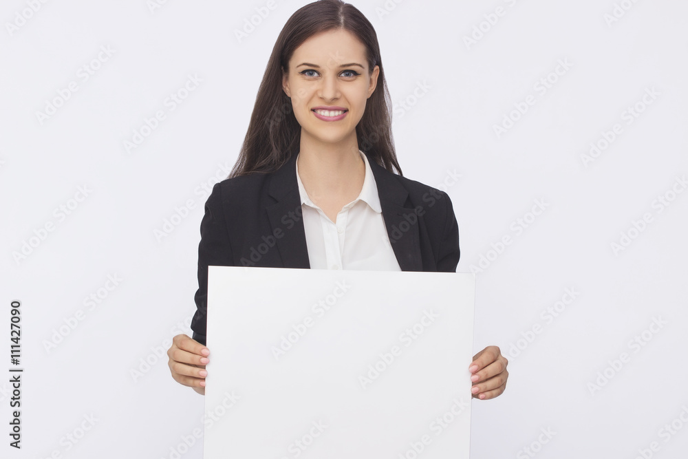 Young smiling woman show blank card Young smiling woman show blank card