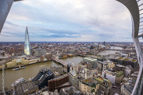 London. England - Panoramic skyline view from the top of Sky Garden's terrace with River Thames and skyscrapers