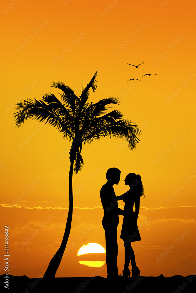 couple kissing on exotic island
