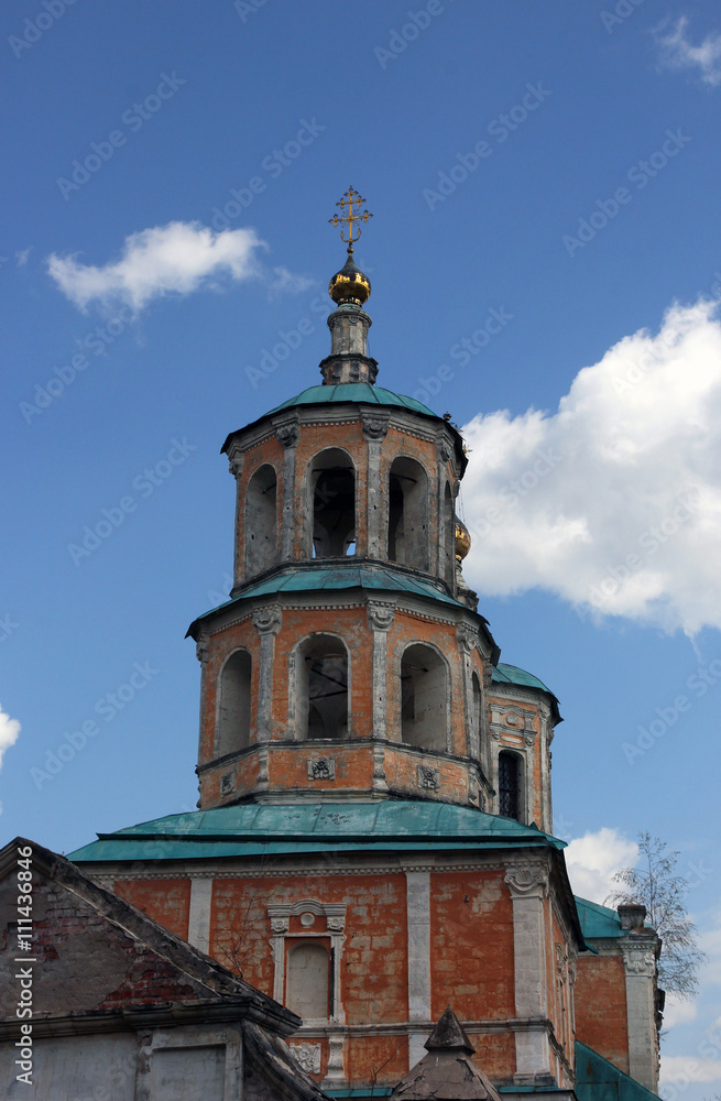 Old abandoned bellfry of russian orthodox church in the classica