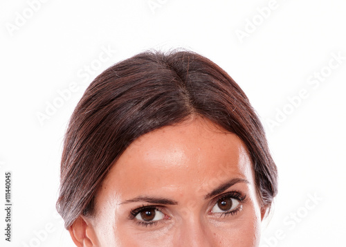Caucasian brunette woman looking at camera