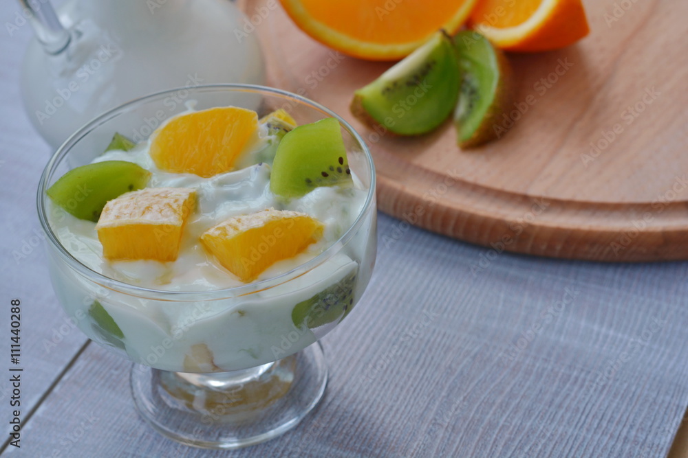 Orange and kiwi in sour cream Orange and kiwi in sour cream