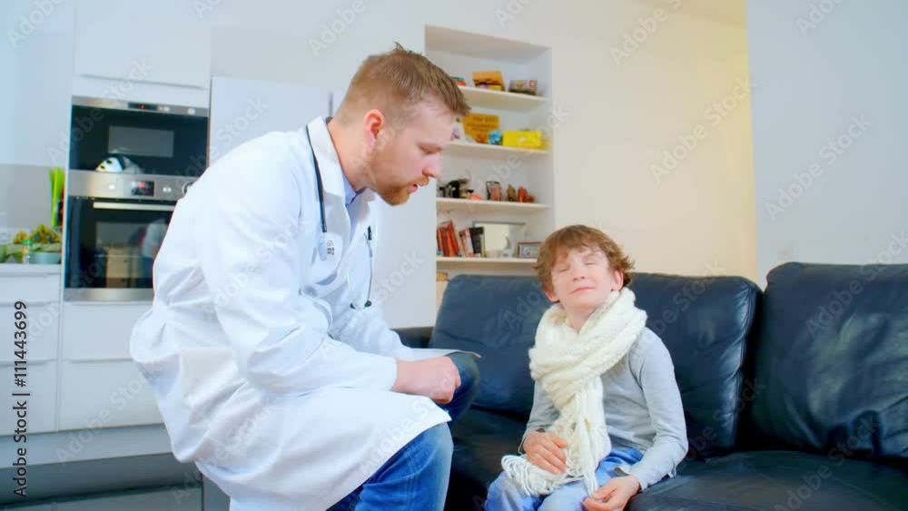 home the doctor came to little boy and ask about his health. boy feels well and smiles home the doctor came to little boy and ask about his health. boy feels well and smiles