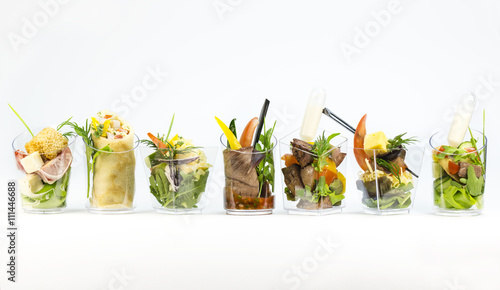Mini Canape with meat and vegetables in plastic cups