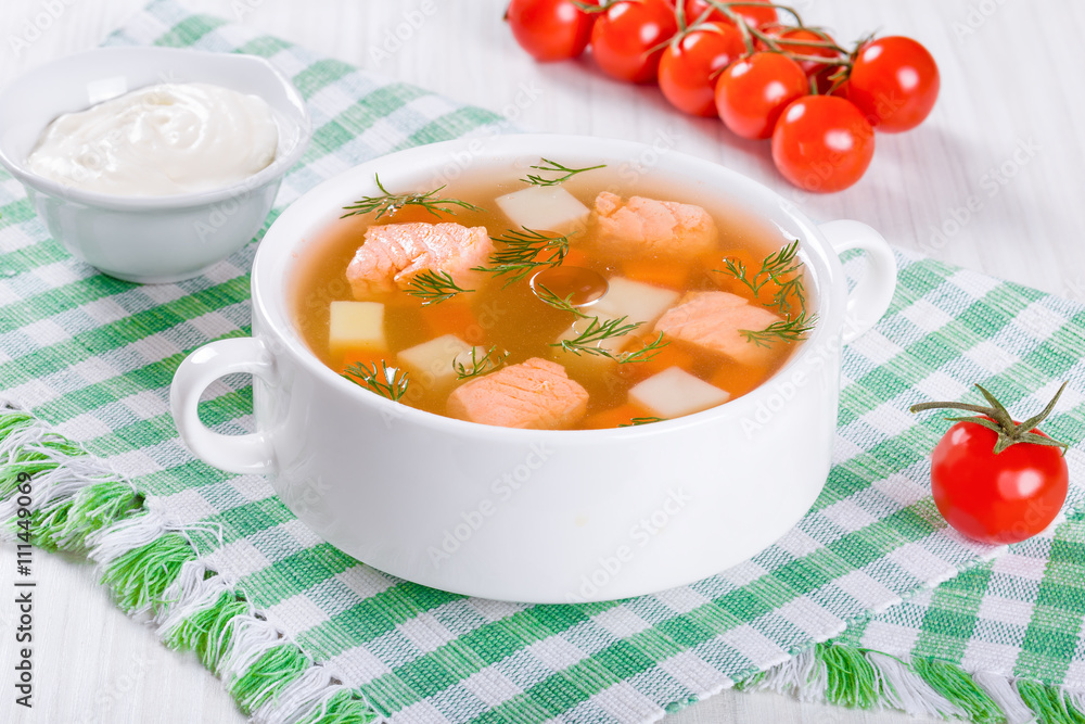 salmon soup with vegetables and dil, close-up salmon soup with vegetables and dil, close-up