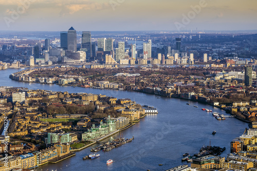 Valokuva London, England - Aerial skyline view of east London with River Thames and the s