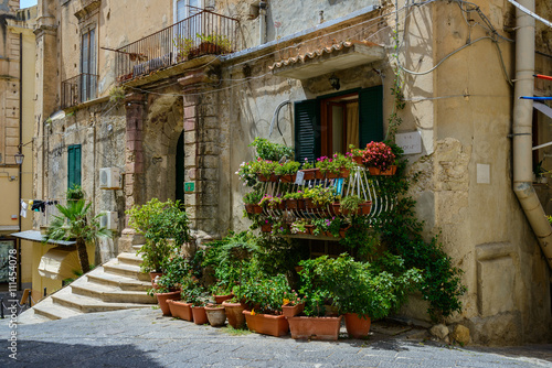 Fototapeta Naklejka Na Ścianę i Meble -  TROPEA, ITALY, JULY 5: an entrance into B&B hotel located in one of the tiny side-street of the town on July 5, 2014, Tropea, Italy.
