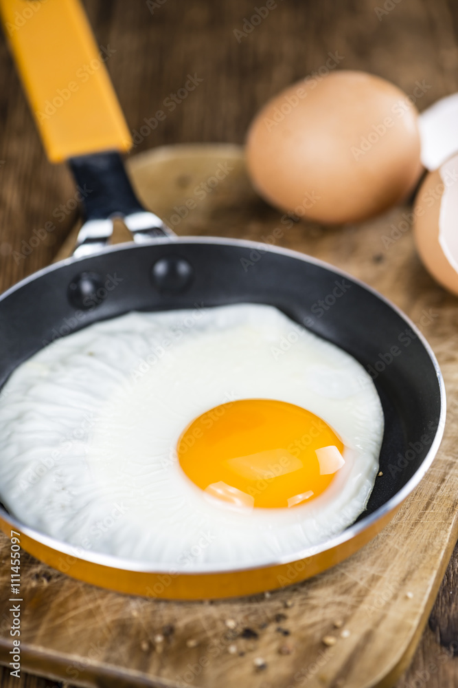 Fried Eggs on wooden background Fried Eggs on wooden background