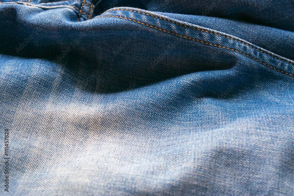 Naklejka premium closed up blue jeans,denim texture,selective focus
