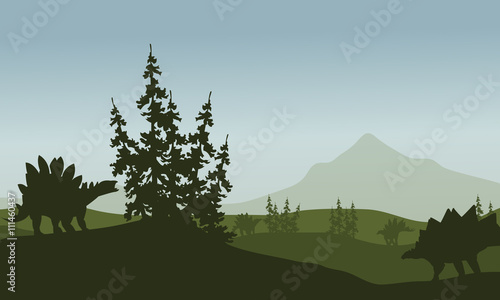 Silhouette of stegosaurus in green fields