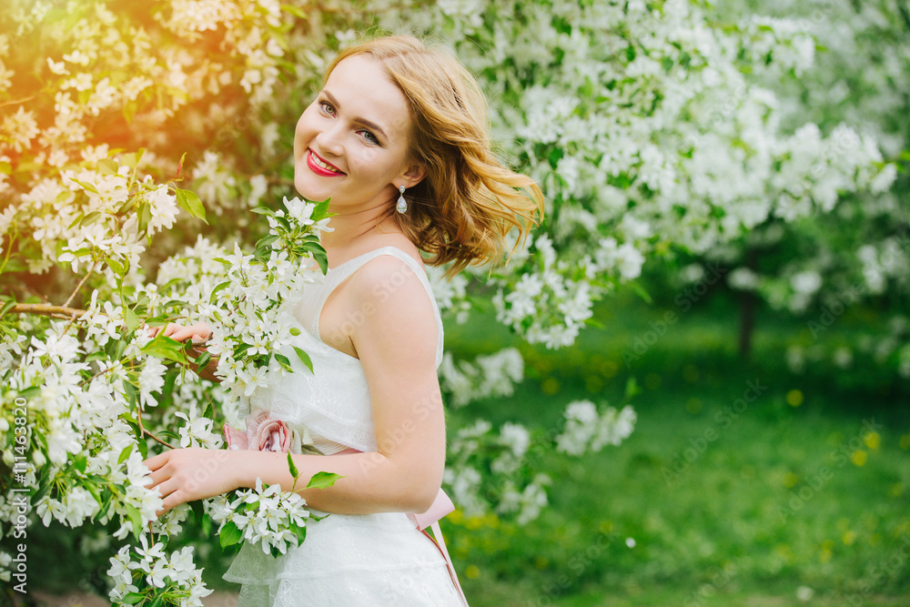 portrait of a beautiful girl in blossoming Apple tree portrait of a beautiful girl in blossoming Apple tree