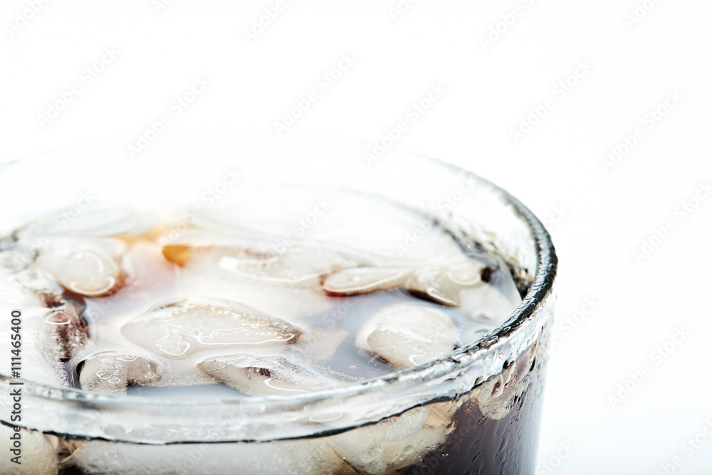 ice with coke in glass ice with coke in glass