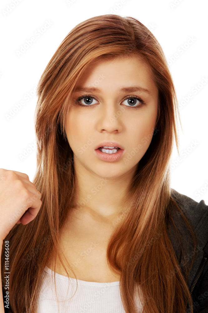Pretty frustrated teenage woman with open mouth Pretty frustrated teenage woman with open mouth