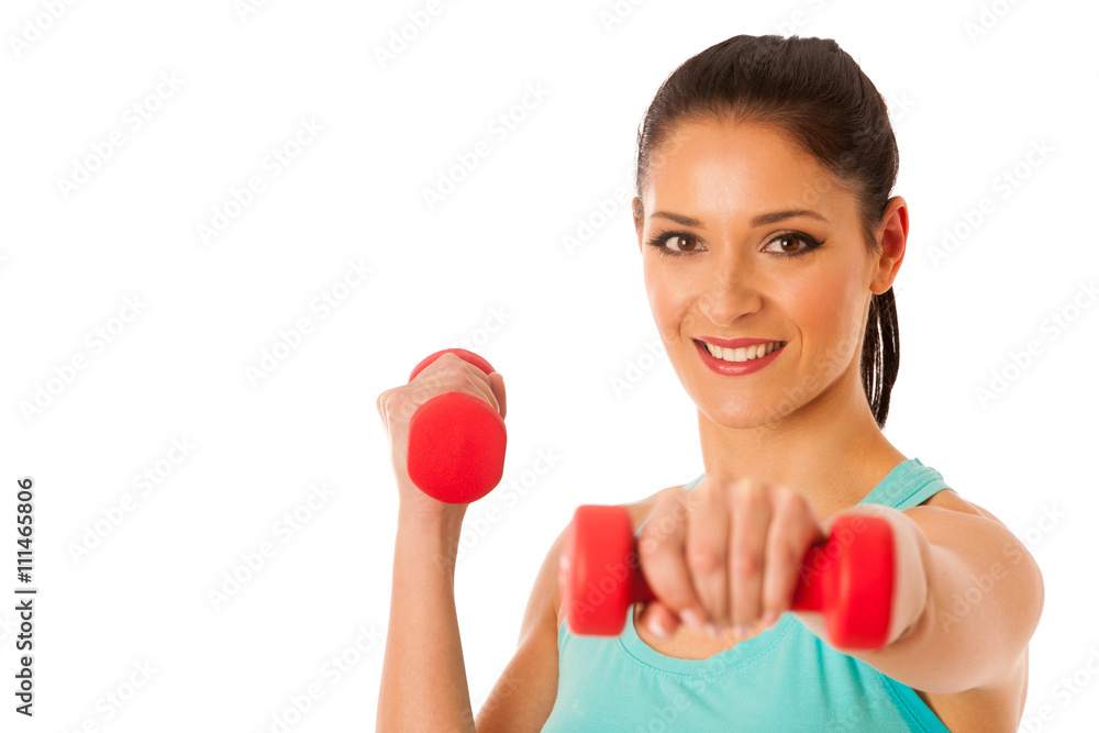 active woman with dumbbells workout in fitness gym isolated over active woman with dumbbells workout in fitness gym isolated over