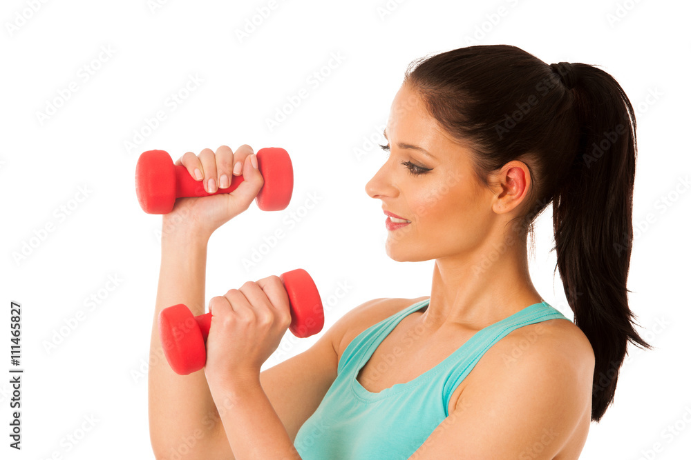 active woman with dumbbells workout in fitness gym isolated over active woman with dumbbells workout in fitness gym isolated over