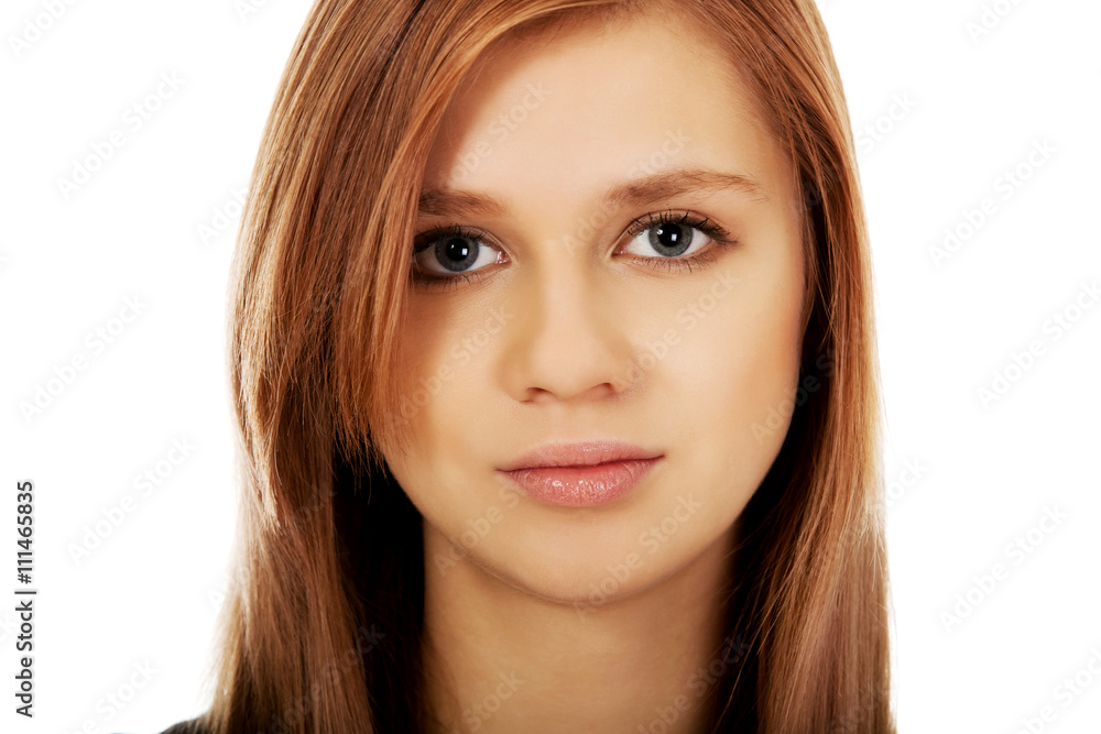 Pretty teenager girl smiling in cheerful mood Pretty teenager girl smiling in cheerful mood