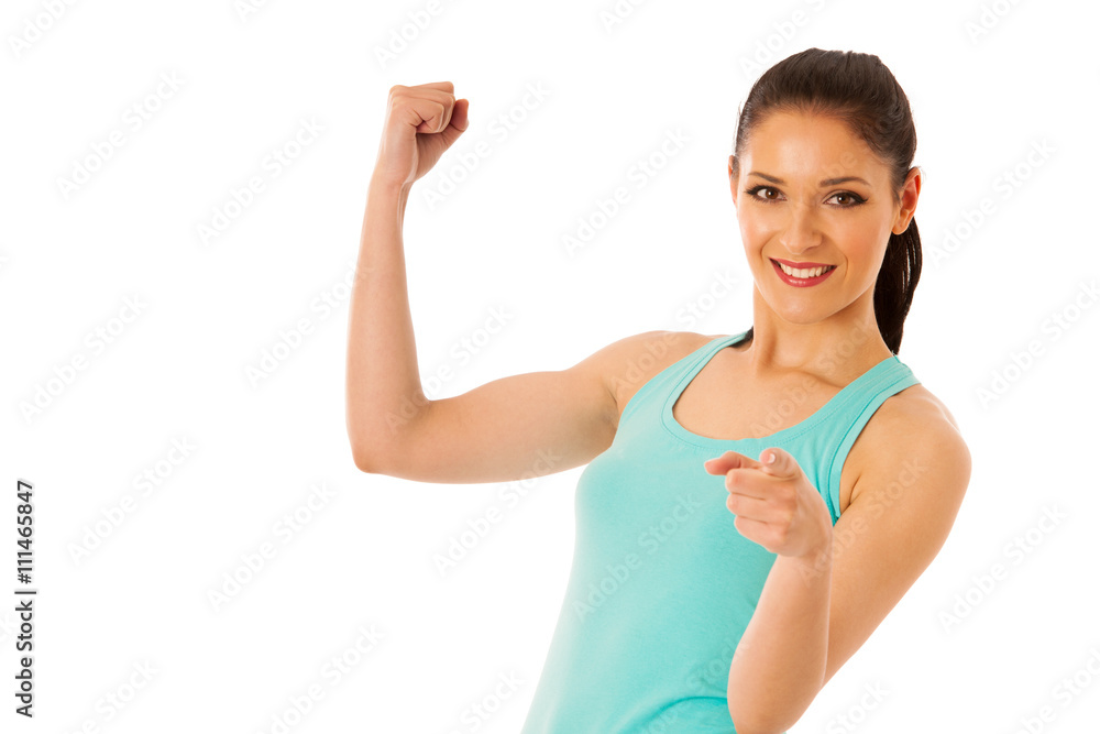 active woman with dumbbells workout in fitness gym isolated over active woman with dumbbells workout in fitness gym isolated over