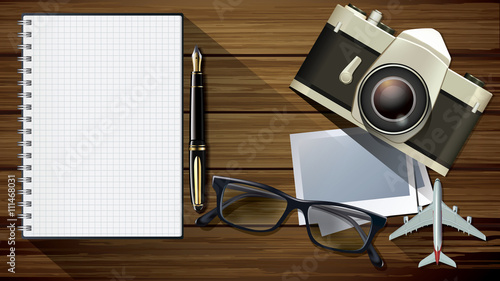 Vector vintage camera, glasses, plane model pen and notepad on w