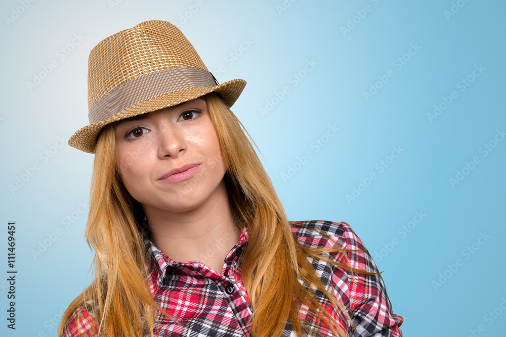 Slim pretty young girl in straw hat