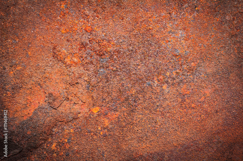 Rusty dirty iron metal plate background. Old rusty metal. Red rusted metal with copy space for text or image. Dark edged