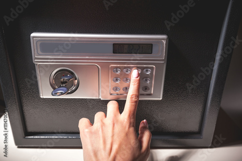 hand opened a safe, close up