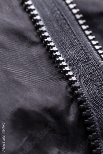 Zipper on black material