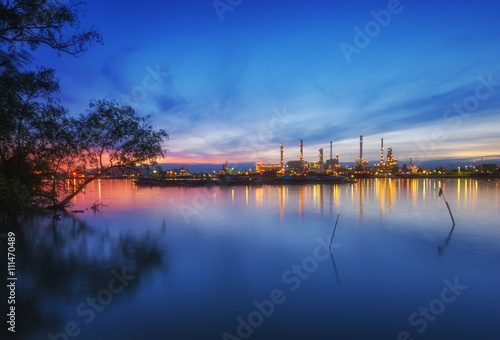 Oil Refinery with blue sky in early morning in Bangkok  Thailand. Concept of Power and Fuel  heavy industry and environment.