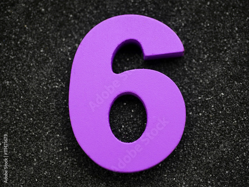 Six. Wooden number