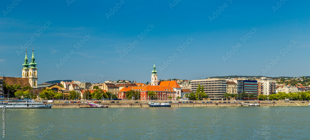 Modern and ancient buildings on the Danube River