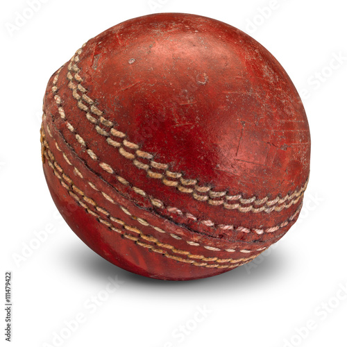 Old worn Cricket Ball isolated on white background with shadow