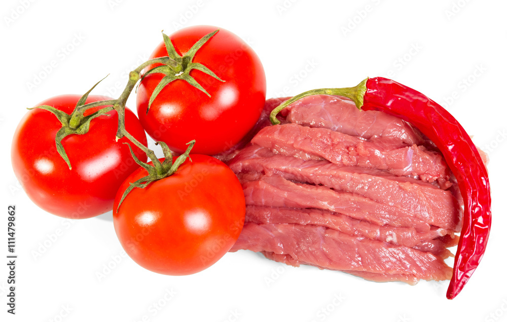 Slices raw meat, tomatoes and hot pepper isolated on white. Slices raw meat, tomatoes and hot pepper isolated on white.