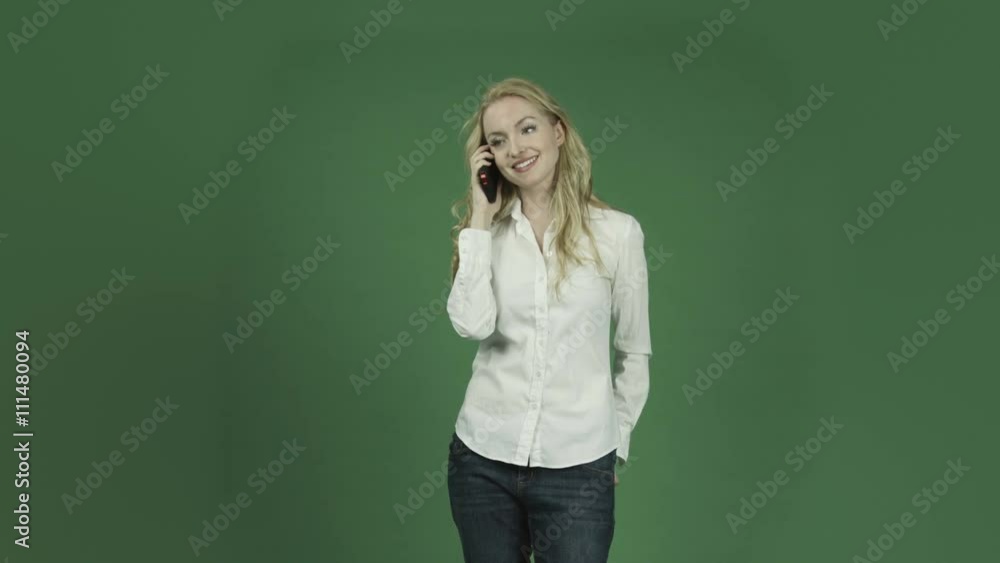 caucasian woman isolated on chroma green screen background happy talking cell phone caucasian woman isolated on chroma green screen background happy talking cell phone