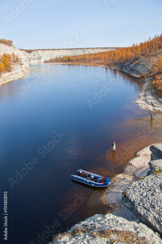 Fishing on the Siberian river while rafting