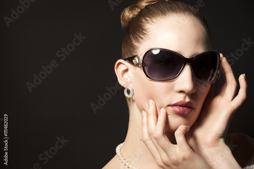 Portrait of Beautiful young woman in sunglasses