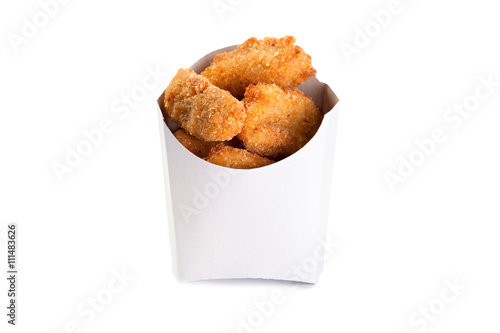 Fried chicken nuggets in a white box isolated on white