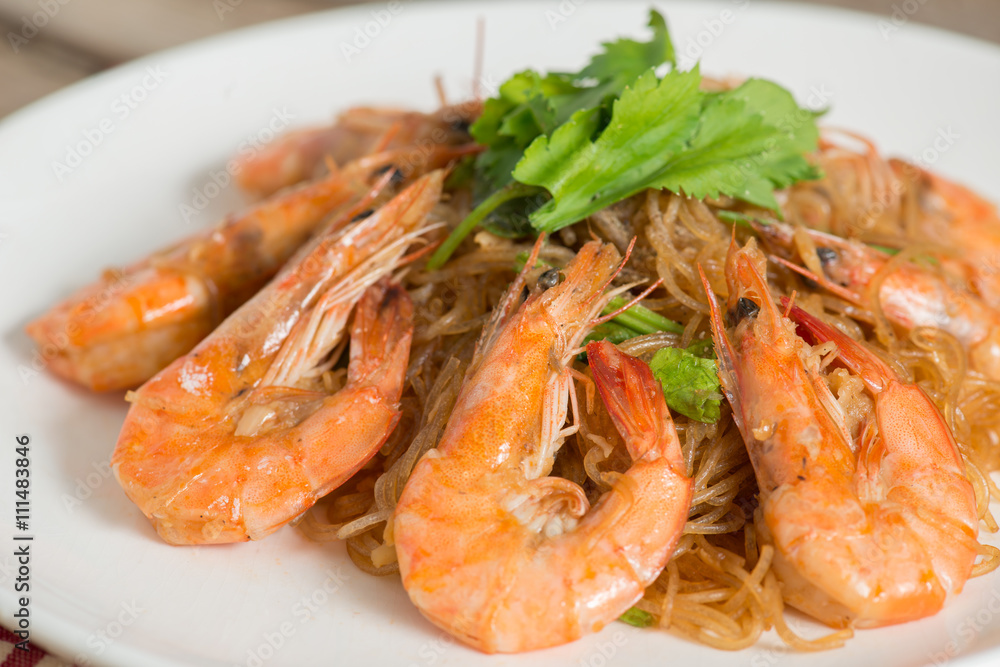 Close up. Shrimp baked with vermicelli, delicious Thai food. Close up. Shrimp baked with vermicelli, delicious Thai food.