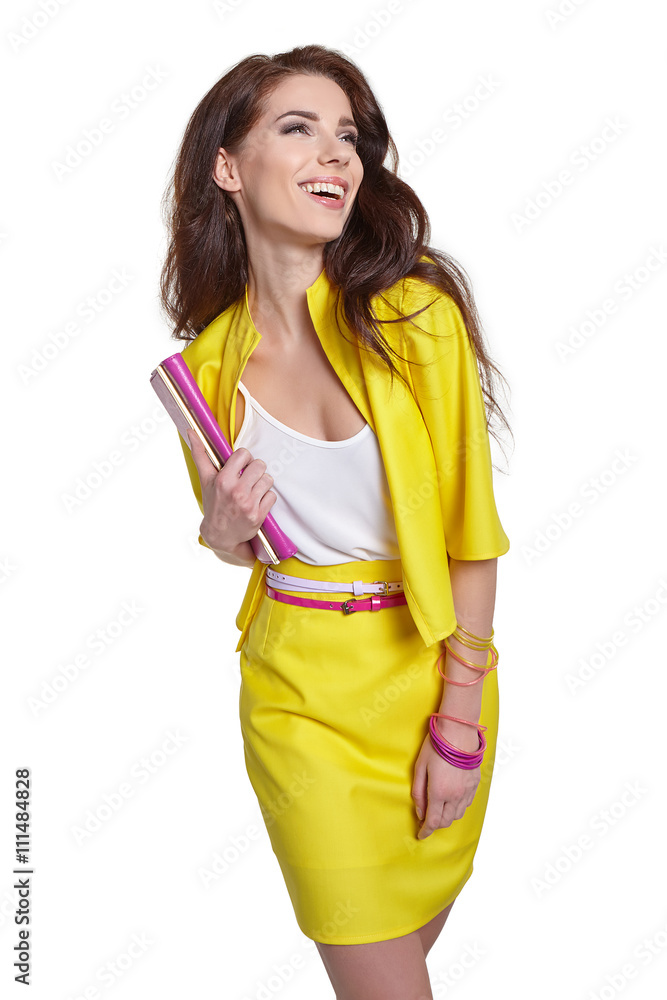 Fashion young model in yellow style against white wall Fashion young model in yellow style against white wall