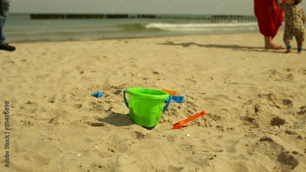 Abandoned pail in the sand at the beach
Abandoned pail in the sand at the beach