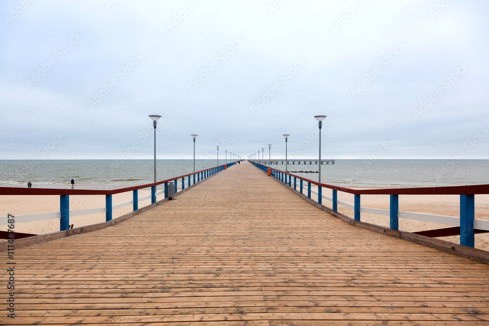 marine pier of Palanga on a cloudy autumn weather, Lithuania